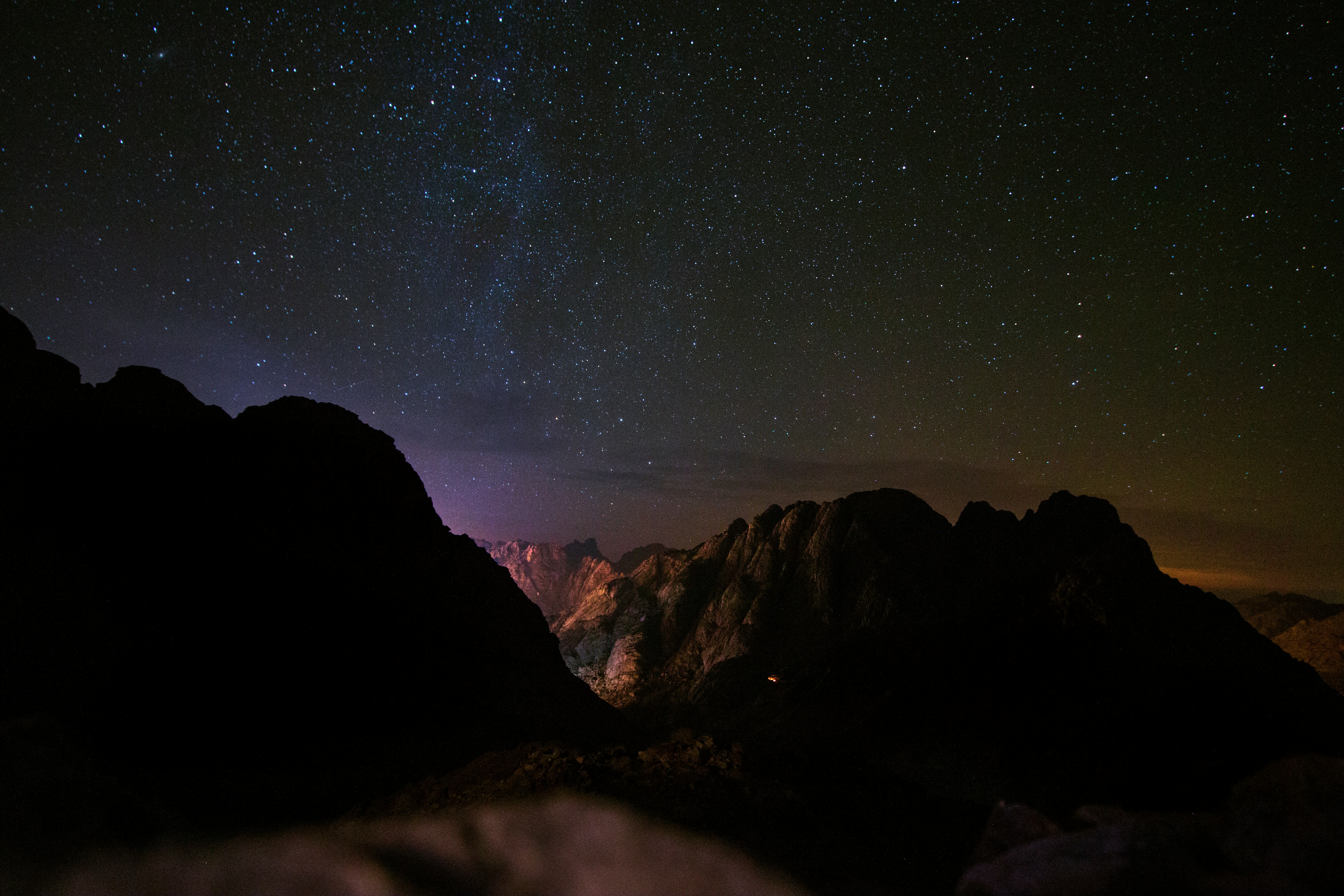 rock mountain during nighttime